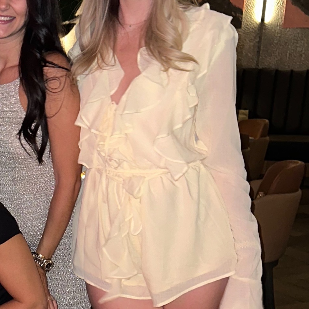 Cream Ruffle Long Sleeve Romper